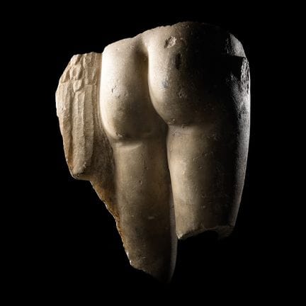 Torso inferiore in marmo romano raffigurante Eros
