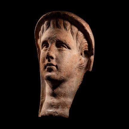 Testa votiva etrusca in terracotta
Circa IV-III se