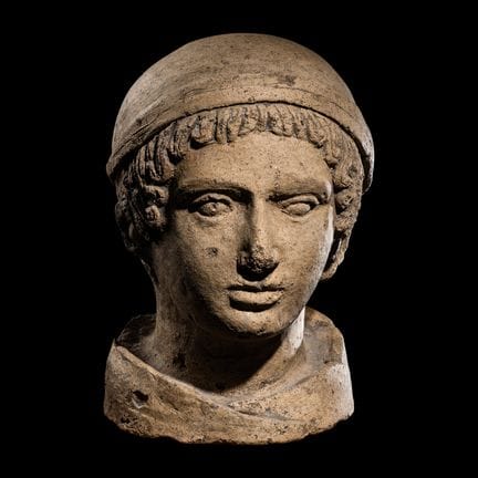 Testa votiva etrusca in terracotta
Circa IV-III se