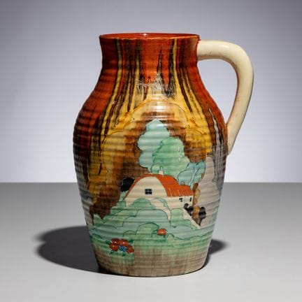 Clarice Cliff
(Inglesa, 1899-1972)
Jarra con motiv
