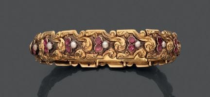 Bracciale rigido e articolato in oro giallo 750, i