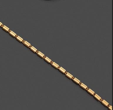 Gelenkige Halskette aus 750er Gelbgold mit stilisi