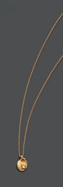 Collana articolata in oro giallo 750 con un ciondo