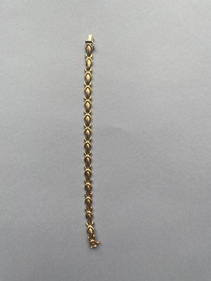 Bracciale articolato in oro giallo 585 millesimi, 