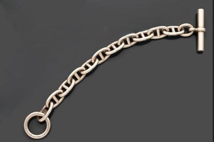 HERMES.
Bracciale articolato in argento 925, con m