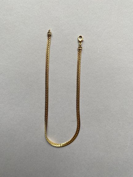 Bracciale flessibile in oro giallo 750, con maglie