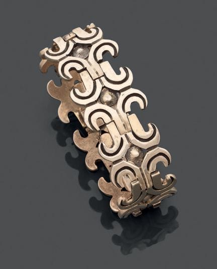 Bracciale articolato in argento 800, con maglie in