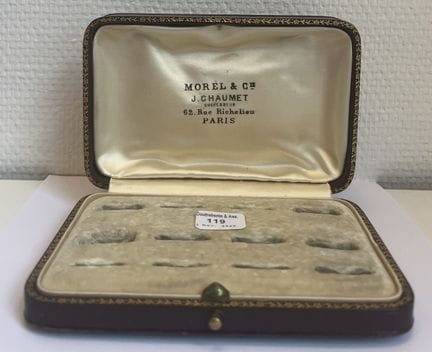Rectangular leather jewelry box with a monogram on