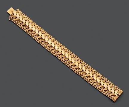 Bracciale articolato in oro giallo 750, con maglie