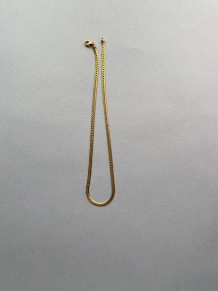 Collana articolata in oro giallo 750, con maglie p
