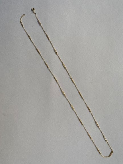 Collana articolata in oro giallo 750, con maglie d