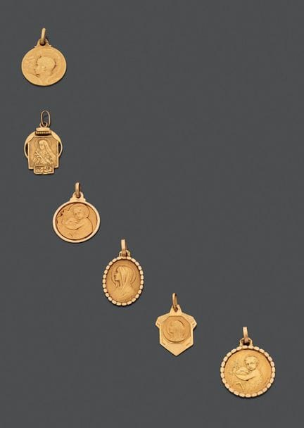 Set di sei medaglie in oro giallo 750, cinque con 