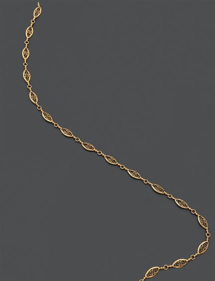 Collana lunga articolata in oro giallo 750, con ma