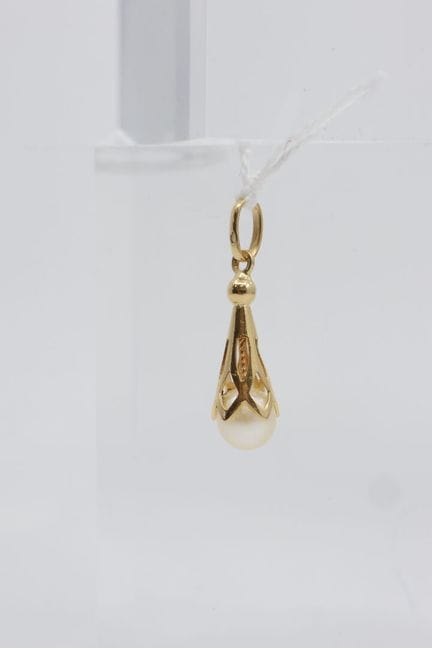 Colgante con montura de oro amarillo (750/00) cala