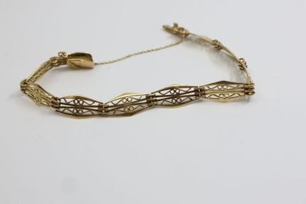 Pulsera semirrígida de oro amarillo (750/00) con e