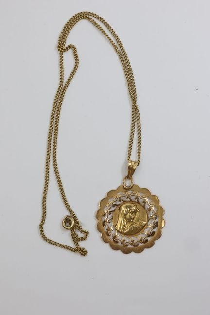 Cadena de oro amarillo 750/00 y medalla religiosa 