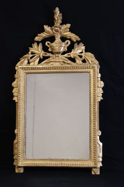Miroir en bois stuqué sculpté doré amortissement à