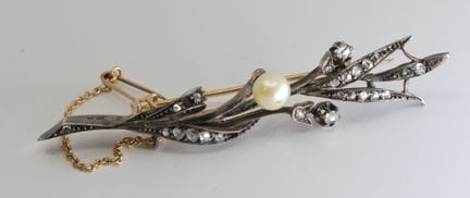 Broche de oro de 750/00 y plata de 800/00, decorad