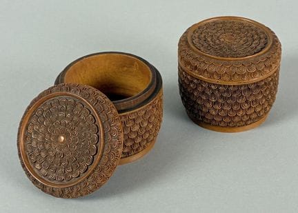 Two round, carved tobacco boxes. Edo period, Japan