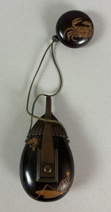 Lacquer and "shibuichi" metal tobacco box with a m