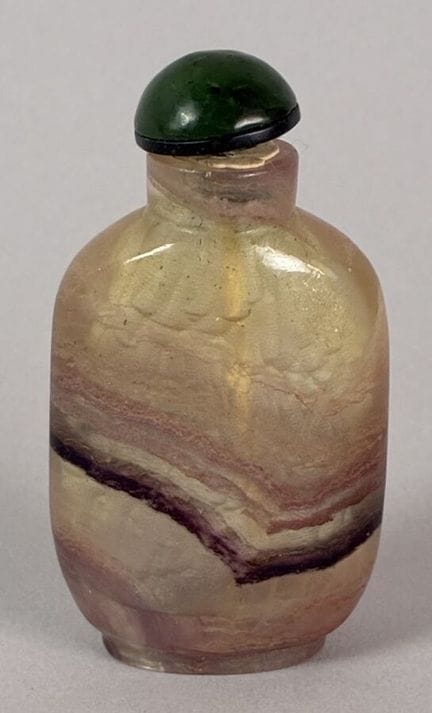 Ribbon-wrapped tourmaline snuff bottle. China, 20t
