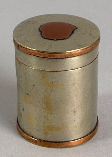 Metal opium box. China, 20th century: 4 cm.