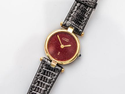 卡地亚（CARTIER）Must系列925镀金腕表，圆形表壳，酒红色表盘（带有裂纹效果）。石英机芯。