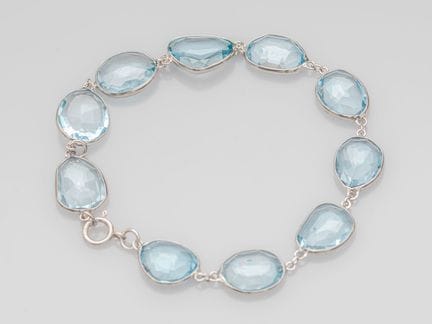Flexible bracelet with a 750°/°° (18K) white gold 