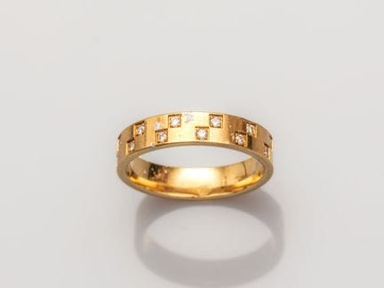 Ring aus 750°/°° (18 K) Gelbgold, besetzt mit klei