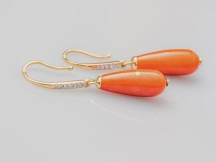 Ein Paar Ohrringe aus 750°/°° (18 K) Zweifarbgold,