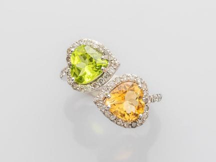 Kreuzring aus 750°/°° (18 K) Weißgold, besetzt mit