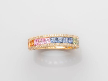 Bague bandeau en or jaune 750°/°°(18K), sertie d'u