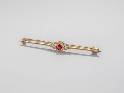 Brosche aus zweifarbigem 750°/°° (18 K) Gold, bese