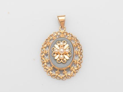 Anhänger aus 750°/°° (18 K) Gelbgold, besetzt mit 