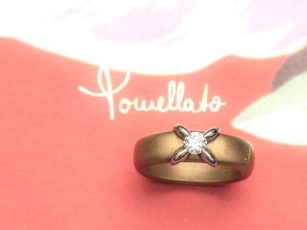 POMELLATO, two-tone 750°/°° (18K) gold solitaire r