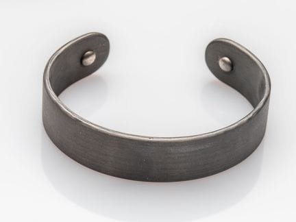 DINH VAN, Pi Carbone open bangle, set with two bla
