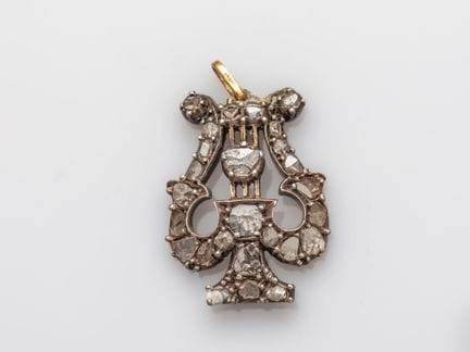 Lyre pendant in 750°/°° (18K) gold and 800 silver,