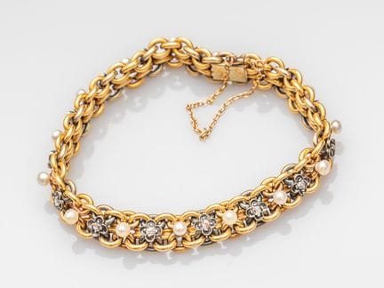Armband aus 750°/°° (18 K) Zweifarbgold mit gefloc