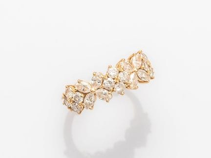 Bandring aus 750°/°° (18 K) Gelbgold, besetzt mit 