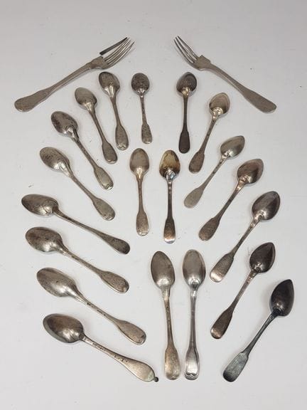 Set of twenty mismatched silver teaspoons and two 