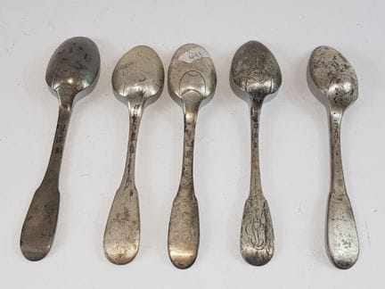 Five Uniplat-style silver spoons, some with number