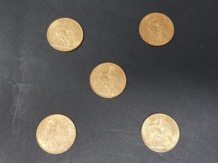 5 monete da 20 franchi d'oro con il gallo degli an