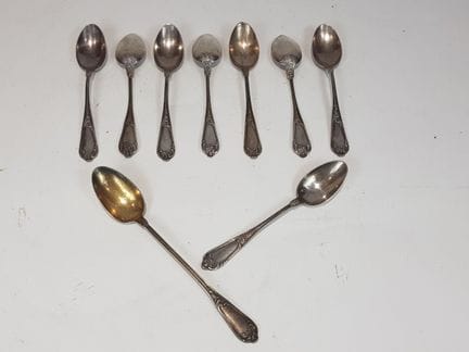 Eight silver teaspoons and one silver jam spoon, L