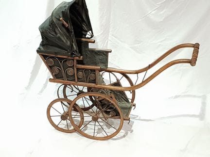 Natural wood doll stroller with a coated canvas in