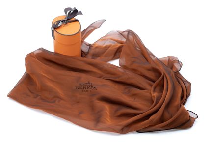 *HERMÈS 
Rust-colored silk chiffon Uni diamond-sha