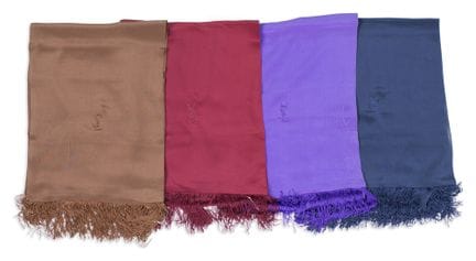 *YVES SAINT LAURENT 
Set of four fringed silk crep