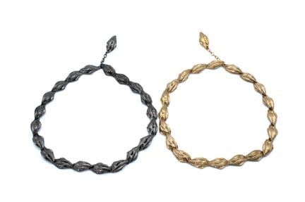 *YVES SAINT LAURENT 
Lot comprising two metal belt
