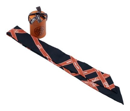 *HERMÈS 
"Bolduc" print silk twilly in red and whi