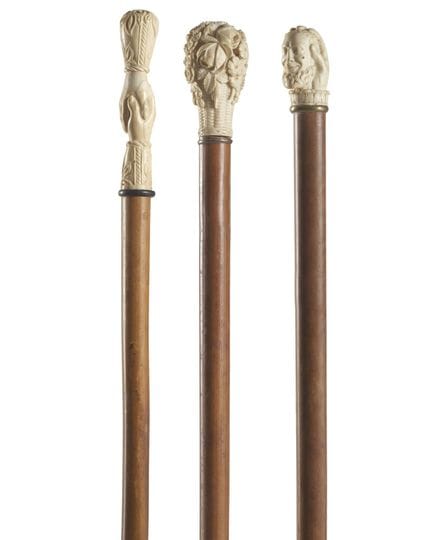 19th-century art. Three walking sticks with carved