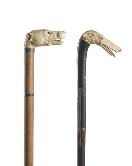 19th-century art. Two walking sticks with ivory ha